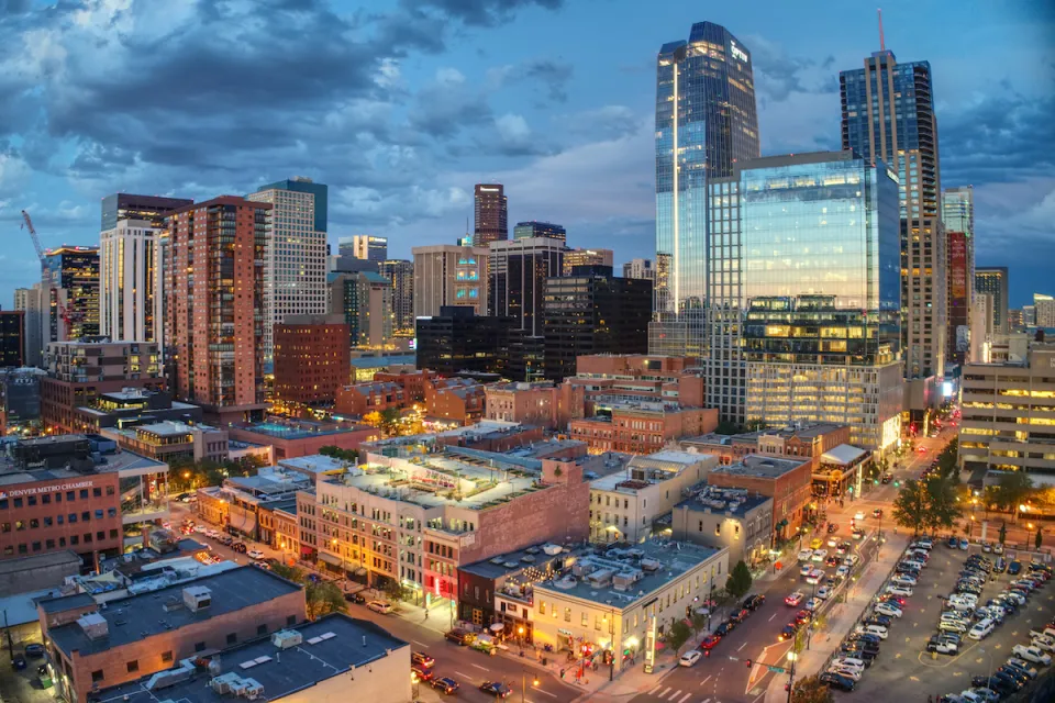 Aerial view of Denver, Colorado skyline at dusk.